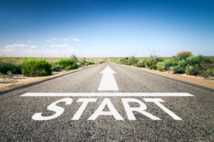 An image of a road to the horizon with text START