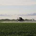 Tractor spraying Roundup